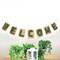 6ft. Cozy Twine Brown & Green "Welcome" Hanging Wall Decoration